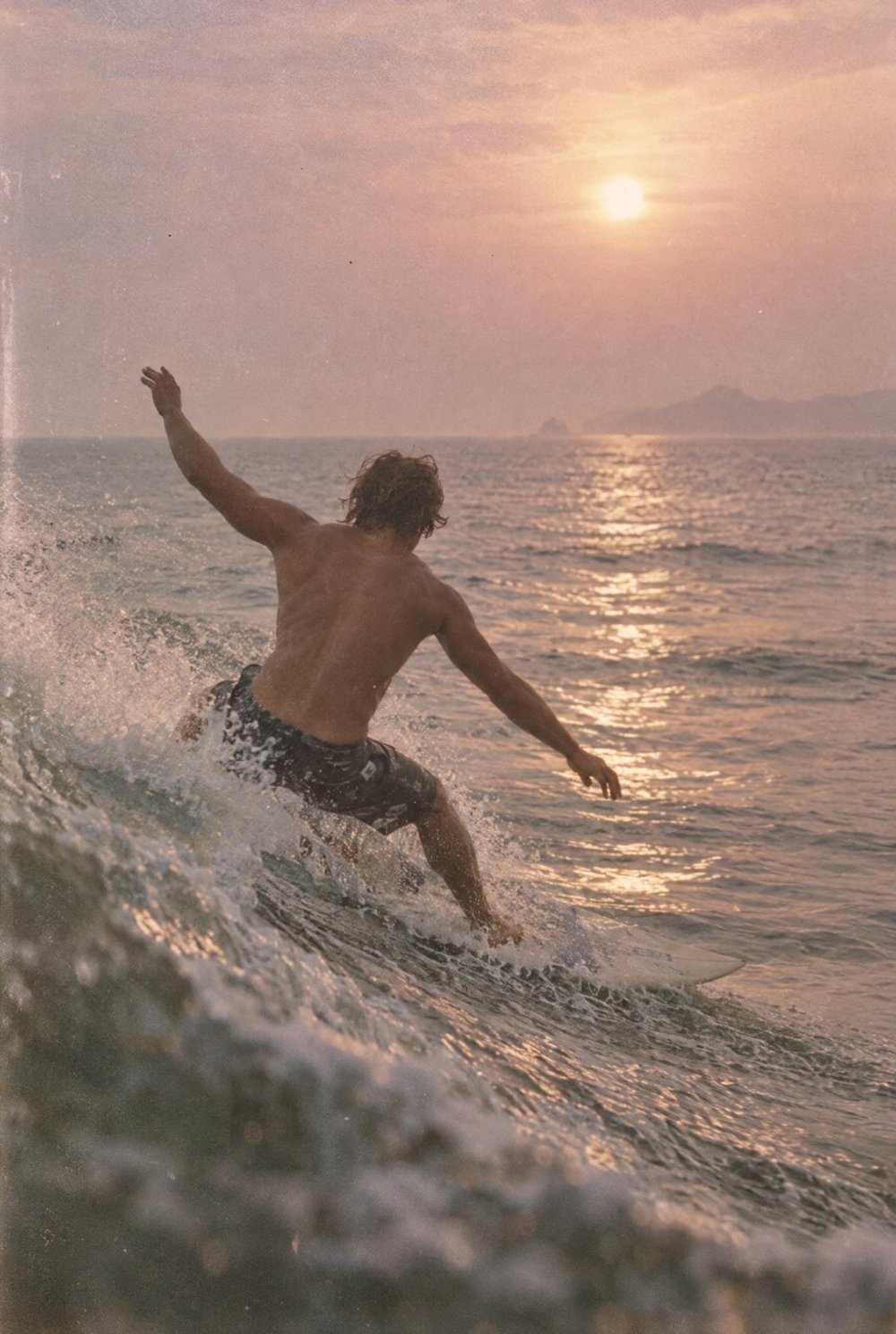Surfer at sunset